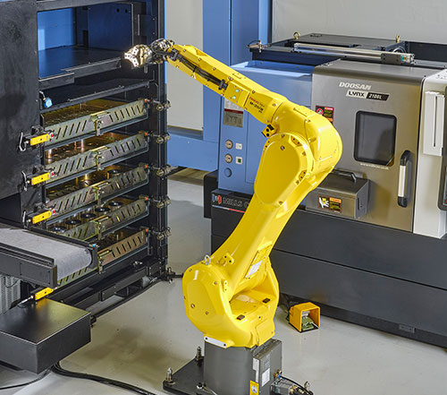 Fanuc robot with 25kg payload capability.