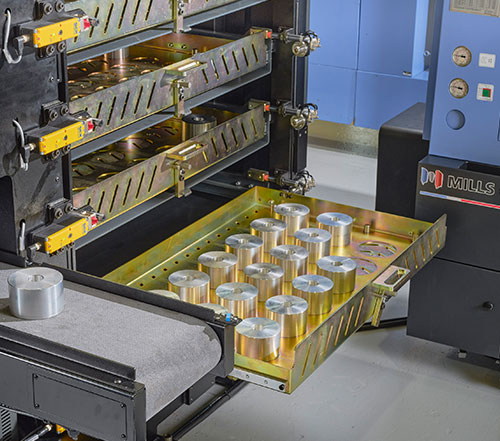 Two way drawer system (loading/unloading station) showing parts’ inspection/ ejector conveyor.